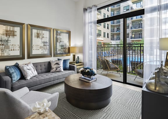 The Raleigh at Sloan's Lake Apartments in Denver, CO Living Room with Private Patio