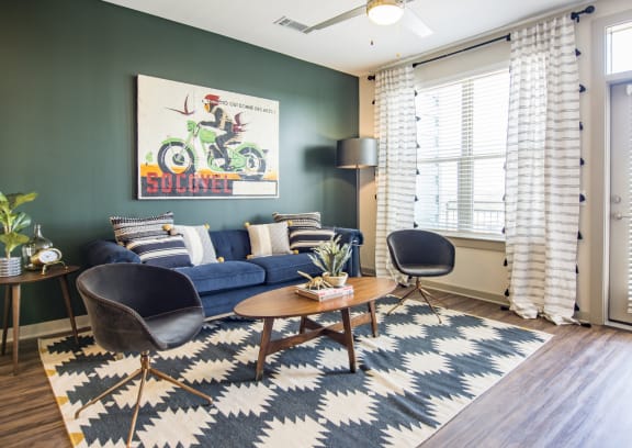 Alton Optimist Park Apartments Model Living Room and Balcony Window
