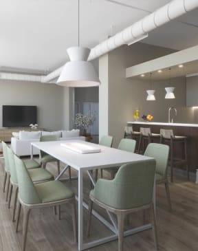 a rendering of a dining room with a table and chairs at East 4th Street, Cleveland