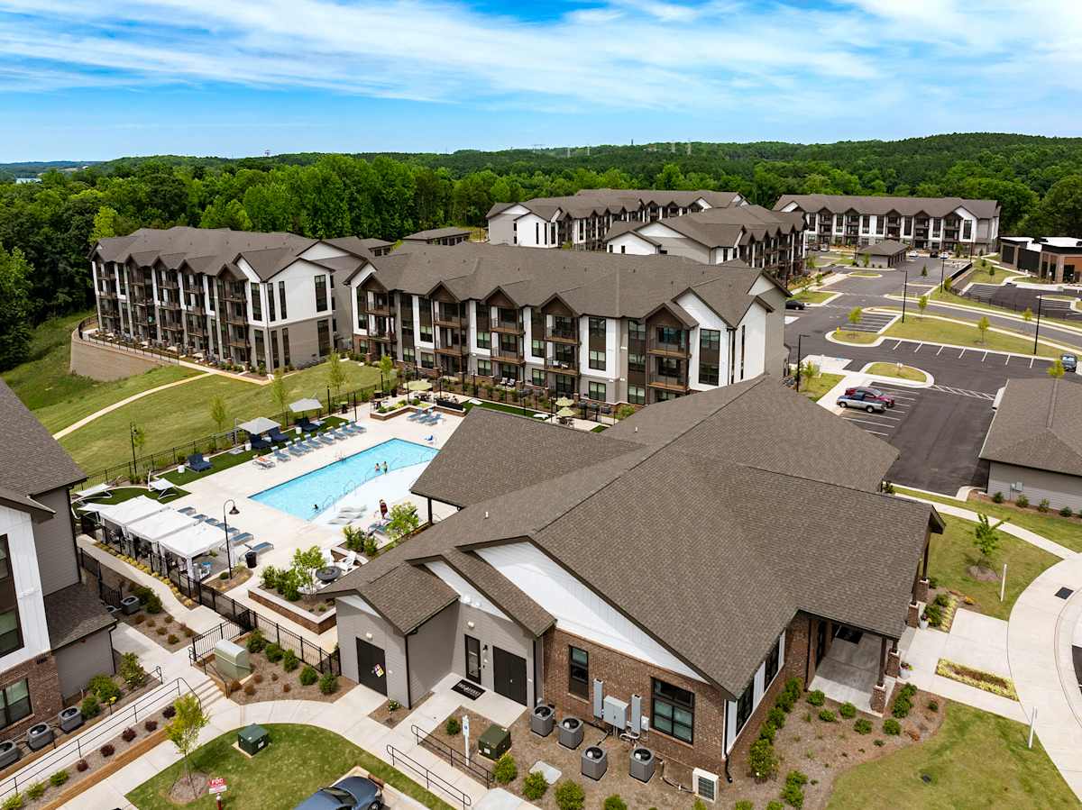 The Banks at Mt. Holly Apartments aerial view with pool - Belmont, NC