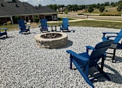 Thumbnail 10 of 25 - Bonfire Pit at Abbey Ridge Apartment Homes, Oxford, Michigan