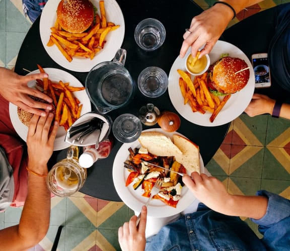 Friends Having Lunch Together