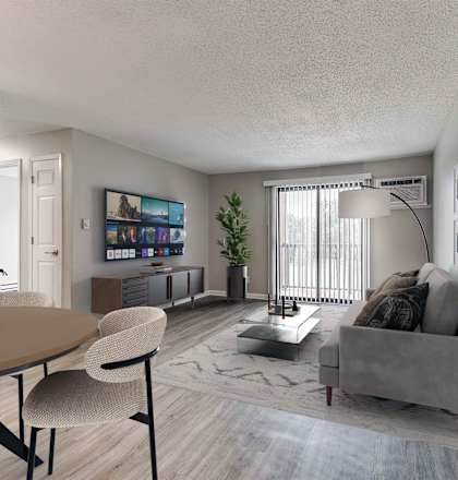 a living room and dining room with a couch and a table