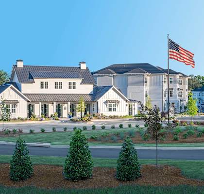 a rendering of a building with an flag in front of it