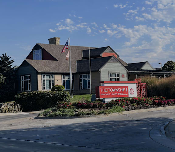 a house with a sign in front of it at The Township, Kansas City, Missouri