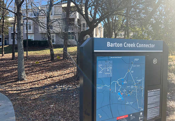 a map connector in front of a building