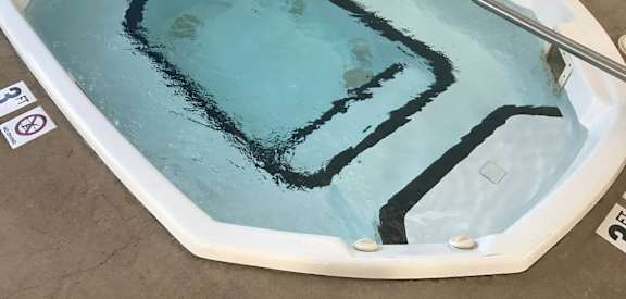a spa with blue water in it at Courtyard Apartments on Belsly, Minnesota