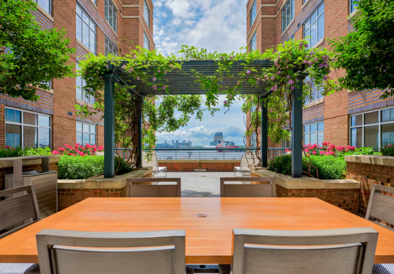 Outdoor lounge space with seating at The Crescent at Fells Point, MD, 21231