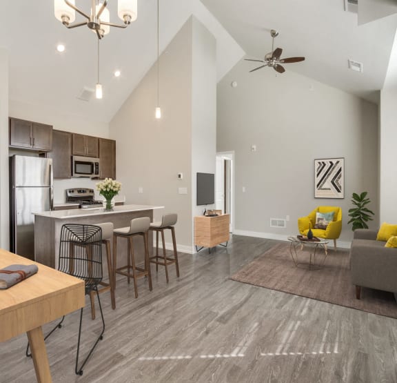 a bedroom with a bed and a ceiling fan at 24 at Bloomfield, Bloomfield Township