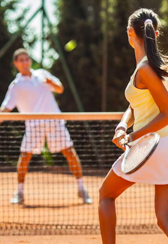 Residents Playing Tennis at Sanford Landing Apartments, 32771