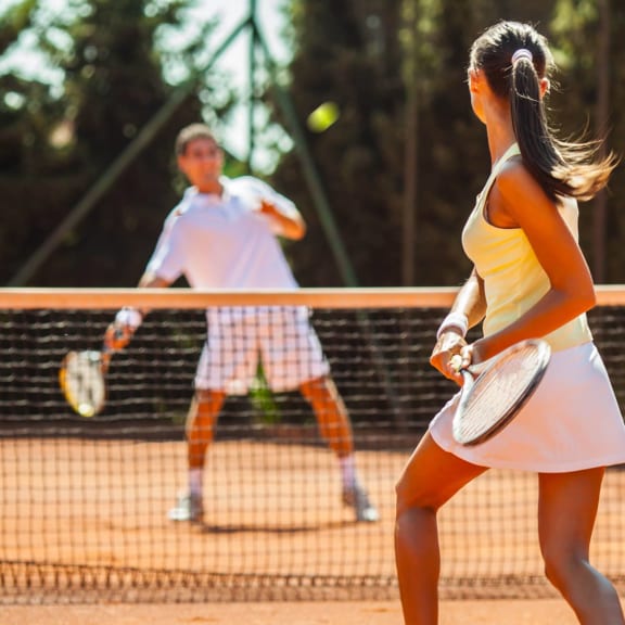Residents Playing Tennis at Sarasota South, 34207