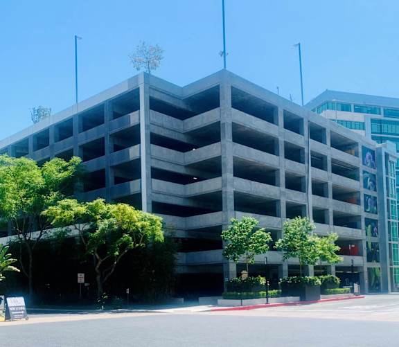 an empty street in front of an office building