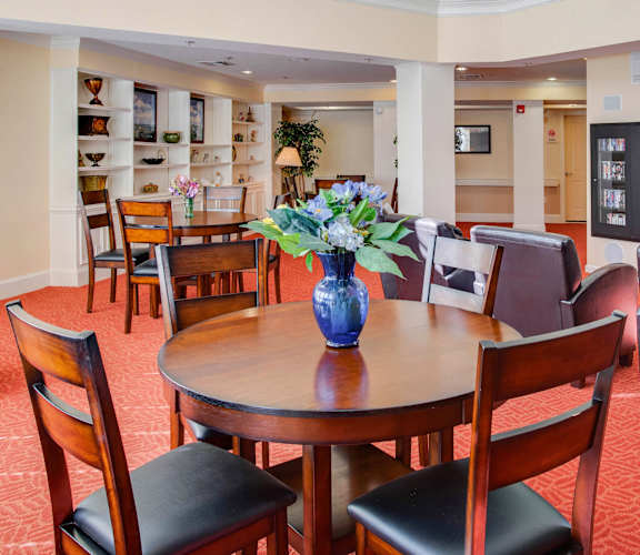 a large table with a vase of flowers on top of it