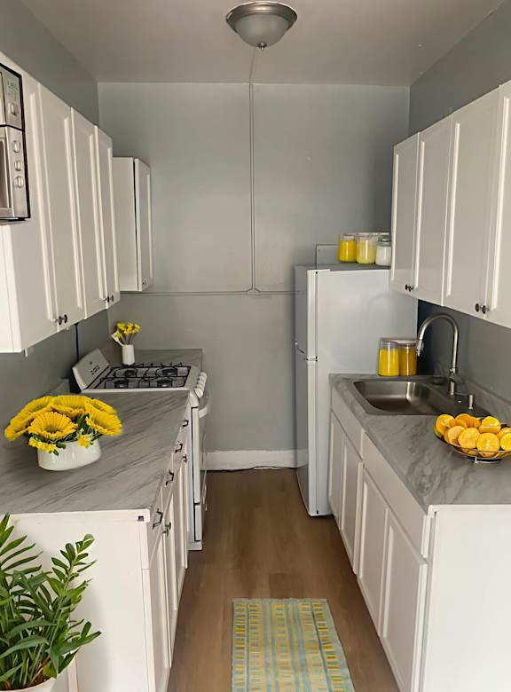 Kitchen with Cabinetry at Lifestyle Apartments at Syracuse, Syracuse, NY