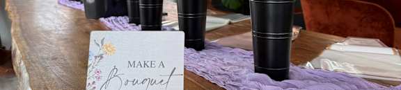 A table with a card that says "Make a Brewt" on it.