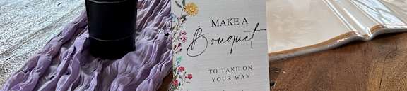 A bouquet of flowers is sitting on a table.