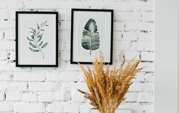 Stock image of dresser and wall decor
