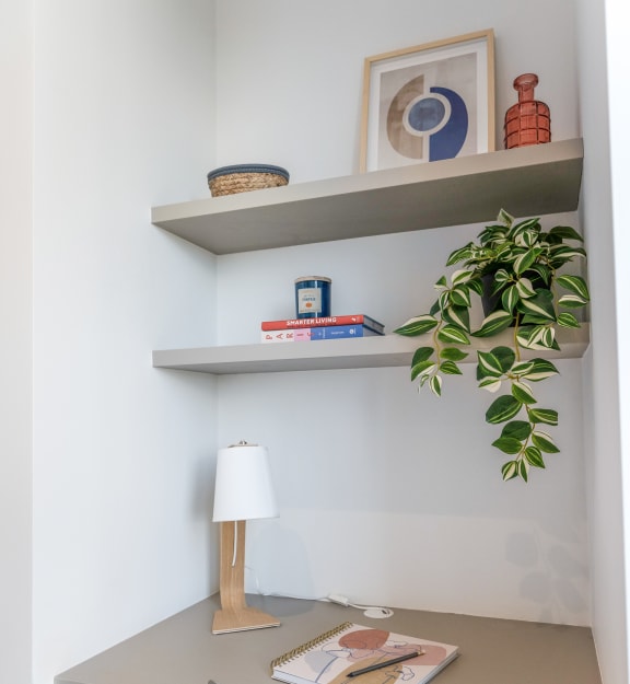 a home office with a desk and a chair