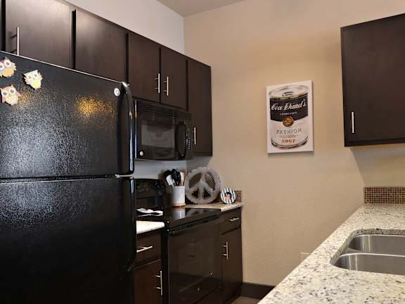 Modern Kitchen With Double Door Refrigerators at H Squared Apartments, Denton, TX, Texas