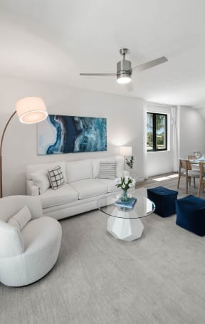 a rendering of a living room with a dining room and kitchen at Altis Santa Barbara, Florida, 34104
