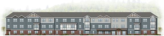 A row of apartment buildings with a forest in the background.