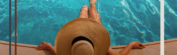 Woman Wearing Straw Hat and Sitting in Pool