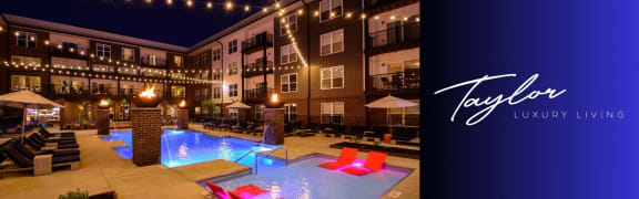 Building exterior at night at Taylor House Apartments, Columbus, OH, 43214