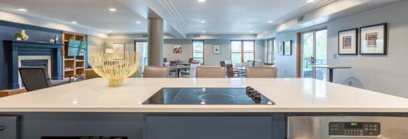 a kitchen with a stove top oven next to a counter top
