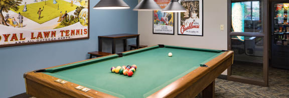 a pool table in the common area
