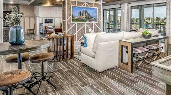 a living room with a couch and a table