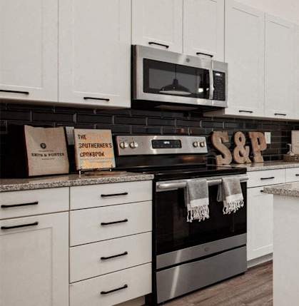 a kitchen with a large counter top and a sink at Smith and Porter, Atlanta, GA, 30313