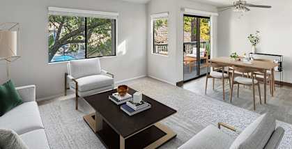 Model Living Room with Carpet & Patio Accessibility at Creek at 2645 Apartments located in Sacramento, CA-HERO.