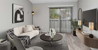 Model Living Room with Carpet and Patio Accessibility at The Meritage Apartments in Vallejo, CA-HERO.