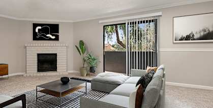 Model Living Room with Carpet and Patio Accessibility at Saratoga Ridge Apartments located in North Phoenix, AZ-HERO.