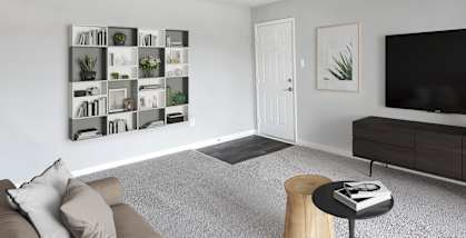 Model Living Room with Carpet at Brightwood Forest Apartments in Dale City, VA-HERO.