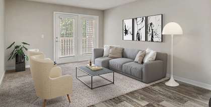 Model Living Room with Carpet and Patio Accessibility at Retreat at Stonecrest Apartments located in Lithonia, GA-HERO.