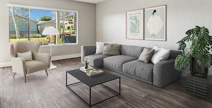 Model apartment living room with a couch and a coffee table