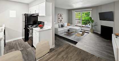Model apartment living room at Revive at 9 Mile Station