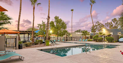 Community Swimming Pool with Pool Furniture at Lakeside Casitas Apartments located in Tucson, AZ-HERO.
