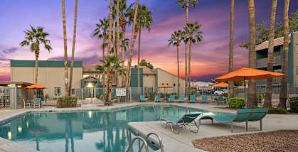 Community Swimming Pool with Pool Furniture at Tanque Verde Apartments located in Tucson, AZ-HERO.