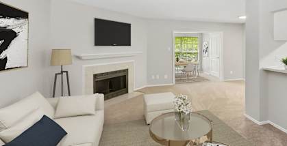 Model living room at Autummwood Apartment Homes in Arlington, TX.