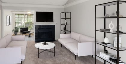 Model Living Room with Carpet and Fireplace at Cobblestone Apartments in Arlington, TX-HERO.