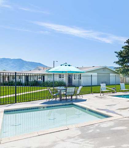 The resort style pool, hot tub, and patio at Cadence.at Cadence Apartments, Roy, UT 84067