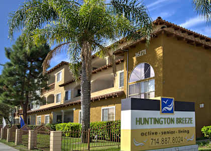 Huntington Breeze senior living community with a clear blue sky.