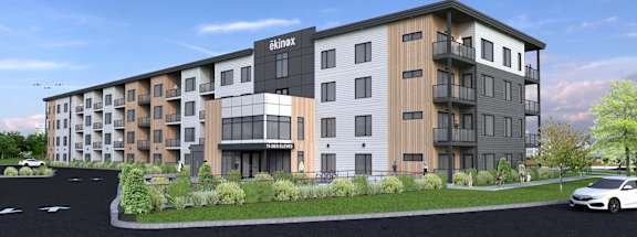 a rendering of an apartment building with a car parked in front of it