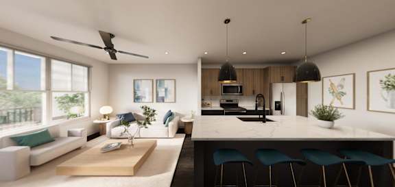 A modern living room with a kitchen area in the background.