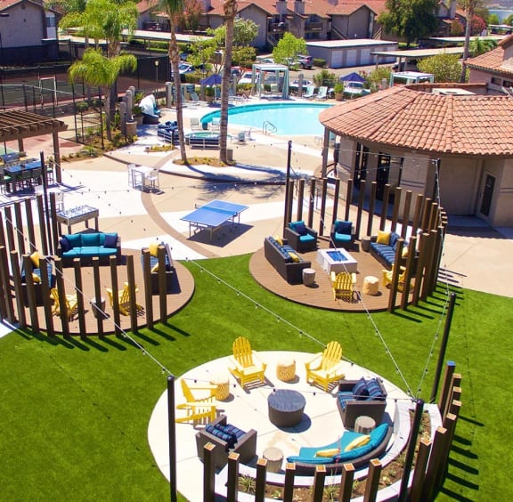 Outdoor poolside lounge at Riverton Apartments