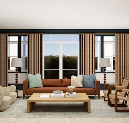 A living room with a brown sofa, two chairs, and a coffee table.