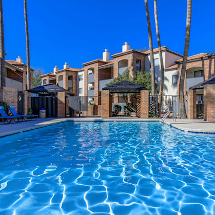 Mission Antigua Apartments in Tucson, Arizona Pool Area with Lounge Chairs