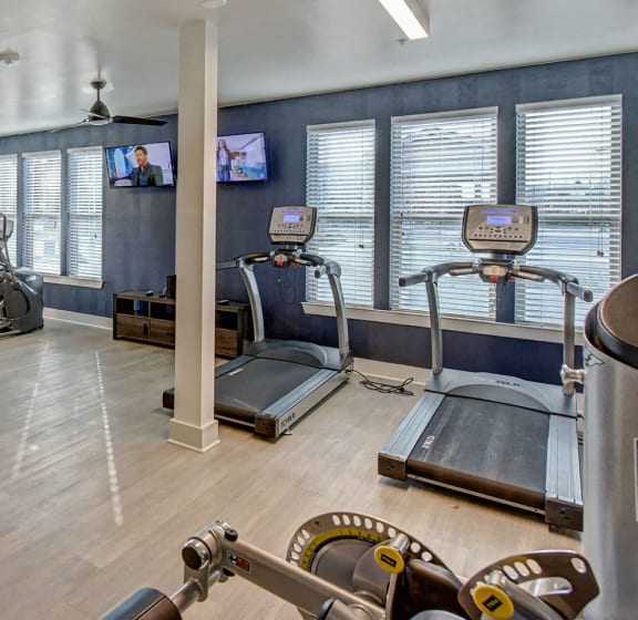 the gym at the district flats apartments in lenexa